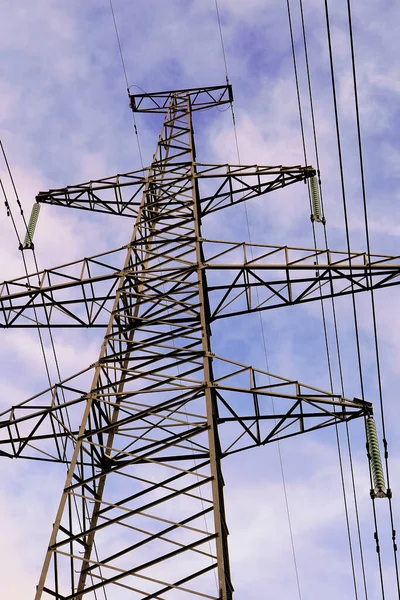 Electricity distribution system. High voltage overhead power line, power pylon, steel lattice tower.