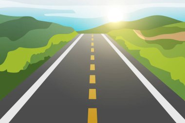 Gün batımında ormanlar ile kırsal alanda asfalt yol.