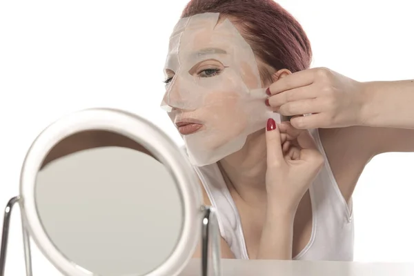 Beautiful Woman Applying Makeup Face Mask White Background — Stock Photo, Image