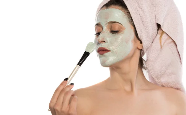 Beautiful Young Woman Facial Mask Her Face Isolated White — Stock Photo, Image