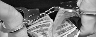 Dolar tutan kelepçeleri ile el