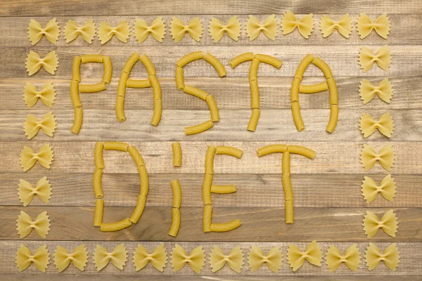Pasta texto de la dieta hecha de pasta cruda — Foto de Stock