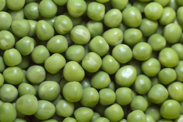 Primeros planos de guisantes verdes —  Fotos de Stock