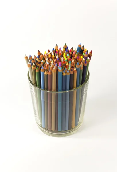 Színes ceruza, egy pohár — Stock Fotó