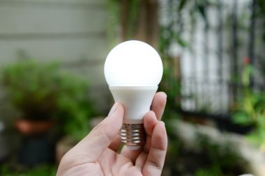 LED bulb with lighting - New technology of energy clipart