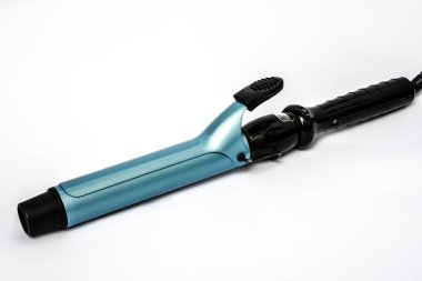 Saç maşası ile izole beyaz perde