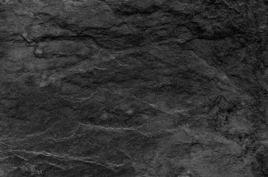 Kırık taş yüzey. Yakın plan. Gri soyut grunge arkaplan. Gri kaya desenli pankart. Boşluğu kopyala.