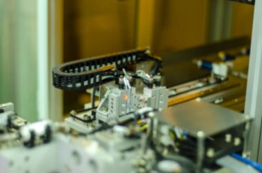 Duvar kağıdı dekoratif tasarımı için fabrika yarı iletken endüstrisinde bulanık arkaplan endüstriyel makine.