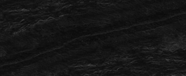 Fotokopi alanı olan koyu gri arkaplan. Taş desenli siyah grunge pankartı. Taş duvarın dokusu..