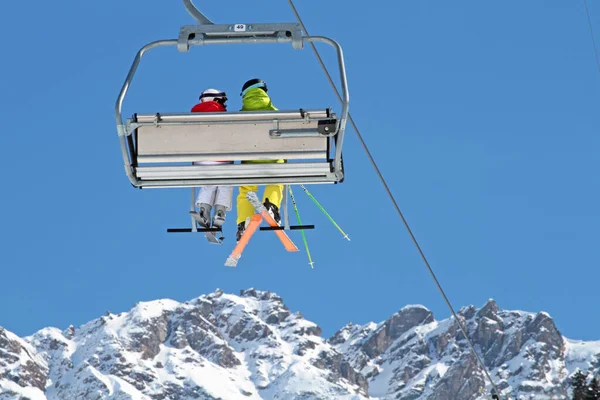 couple in a chair lift