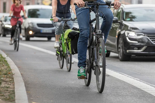 cyclists on street lane