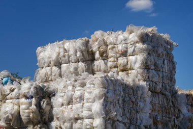 Stacked packages of old plastic bags for recycling