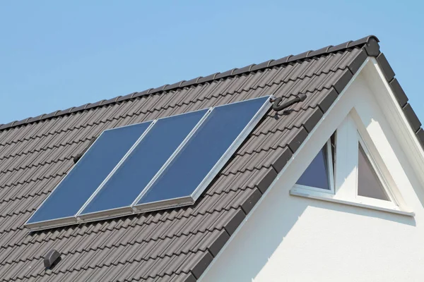 solar thermal system on grey roof