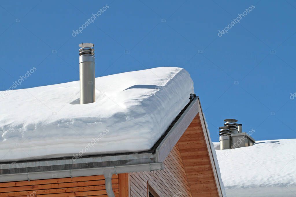 tailpipes on snowy rooftops