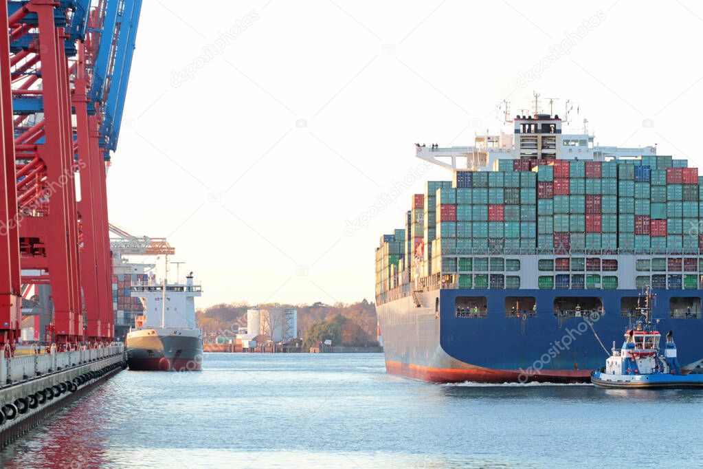 ship leaves container terminal Eurogate in Hamburg