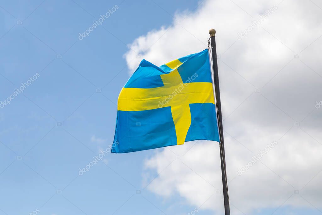 swedish flag on a small flagpole