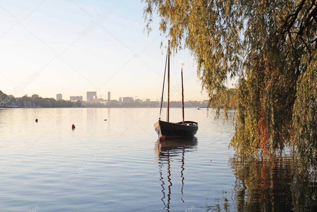 small boat lies on the alster lake