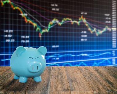 ahşap zemin üzerine mavi domuz banka bulanıklık borsa backgrou