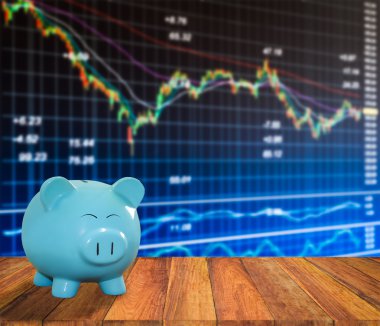 ahşap zemin üzerine mavi domuz banka bulanıklık borsa backgrou