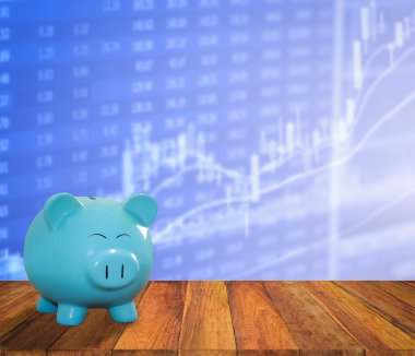 ahşap zemin üzerine mavi domuz banka bulanıklık borsa backgrou