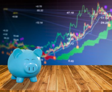 ahşap zemin üzerine mavi domuz banka bulanıklık borsa backgrou