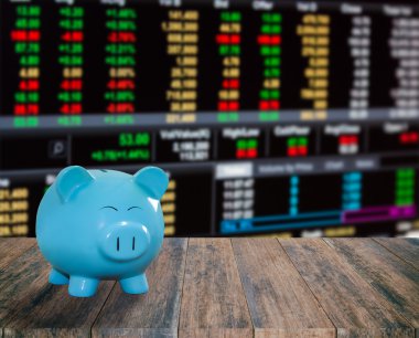 ahşap zemin üzerine mavi domuz banka bulanıklık borsa backgrou
