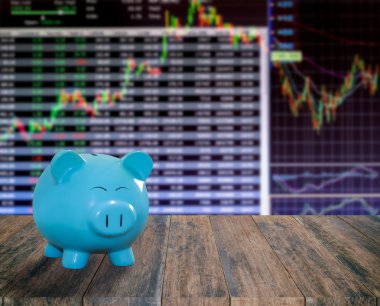 ahşap zemin üzerine mavi domuz banka bulanıklık borsa backgrou