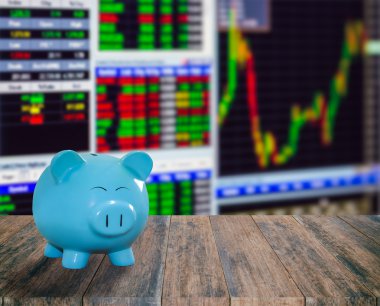 ahşap zemin üzerine mavi domuz banka bulanıklık borsa backgrou