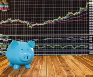 ahşap zemin üzerine mavi domuz banka bulanıklık borsa backgrou