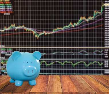 ahşap zemin üzerine mavi domuz banka bulanıklık borsa backgrou