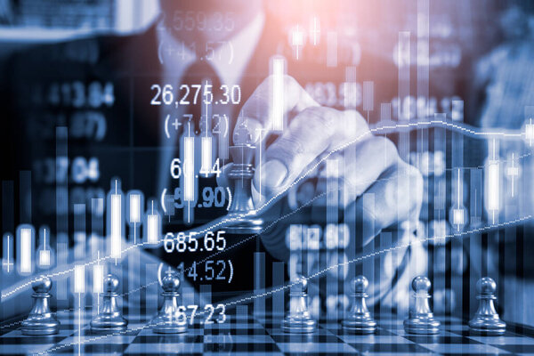 Chess game on chess board behind business man background. Business concept to present financial information and marketing strategy analysis. Investment target in global economy and digital commercial.