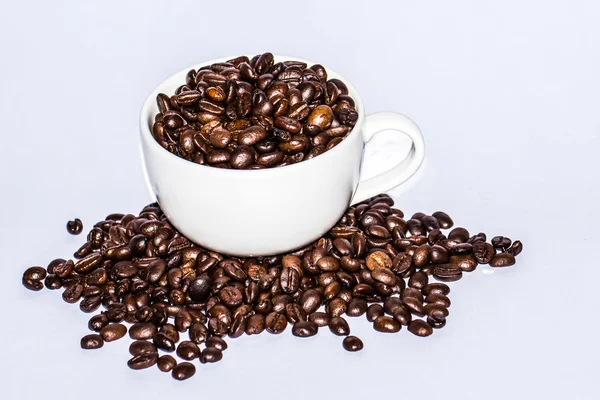Coffee bean on the cup — Stock Photo, Image