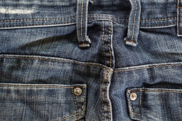 Detail of back blue jeans