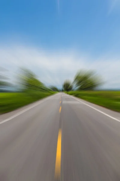 Strada in movimento effetto sfocatura — Foto Stock
