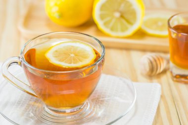 Bal ve limon ahşap arka plan, sıcak tonlama, seçileceği yer ile çay