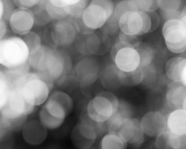 Siyah ve beyaz arka plan üzerinde soyut dairesel bokeh