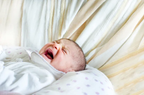 Temper tantrums baby cry loud screaming head lying — Stock Photo, Image