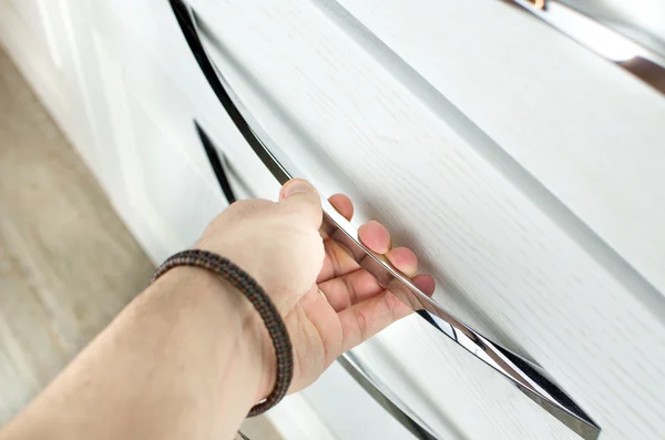 Hand open drawer — Stock Photo, Image