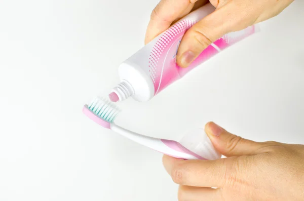 Pink toothpaste toothbrush — Stock Photo, Image