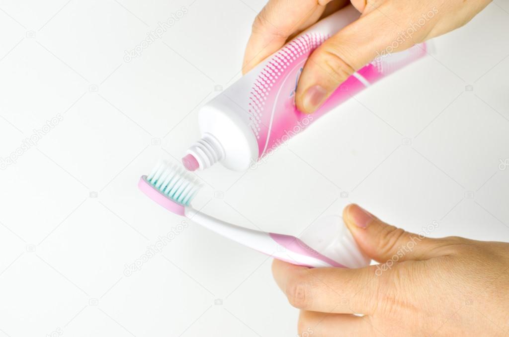pink toothpaste toothbrush