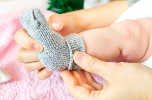 Baby wear grey socks — Stock Photo, Image