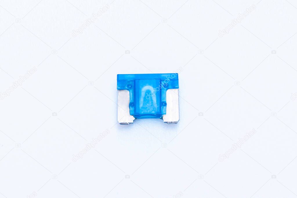 Car fuse on white background micro size use for protection in electric system of car