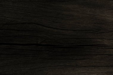 Koyu kahverengi eski ahşap ve yüzeyde doku ve arkaplan için çatlak desenleri