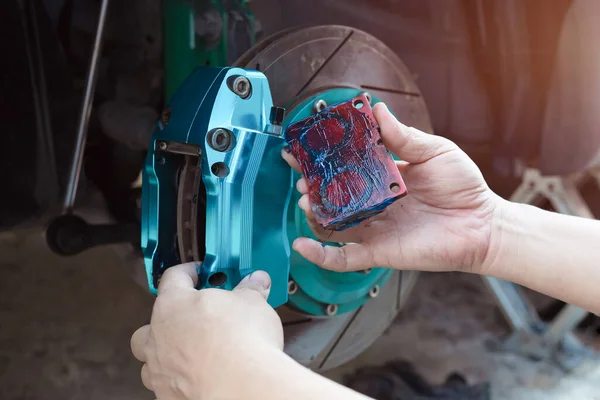 Car Technician Hold Brake Pads Grease Seize Service Car Maintenance — Stock Photo, Image