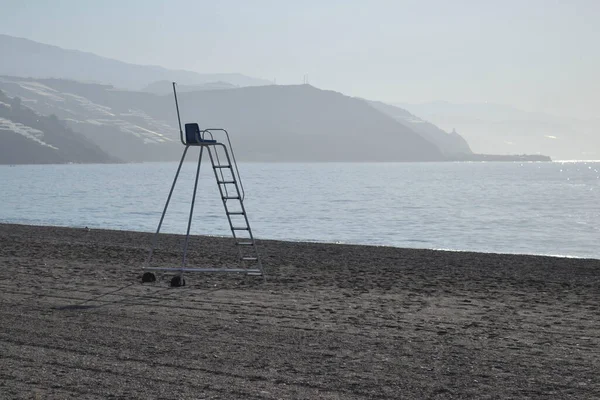 Lonely Lifeguard Chair Castell Ferro Beach Lot Haze Mountain Background — Stock Photo, Image