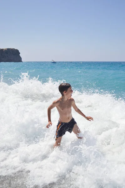 Boy Playing Water Jumping Waves — Stock Photo, Image