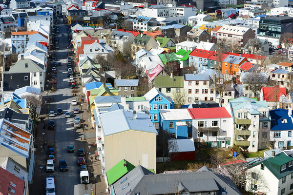 A panorama view of colorful houses in Reykjavik city center, Iceland under a clear blue sky