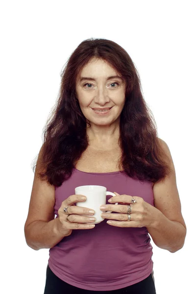 Mujer sosteniendo una taza en la mano —  Fotos de Stock