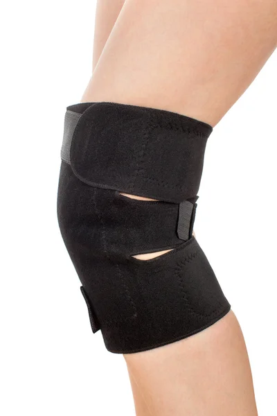 Leg with tourmaline knee pad Stock Photo