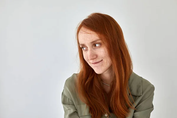 Shy woman with freckled skin and ginger hair — Stock Photo, Image